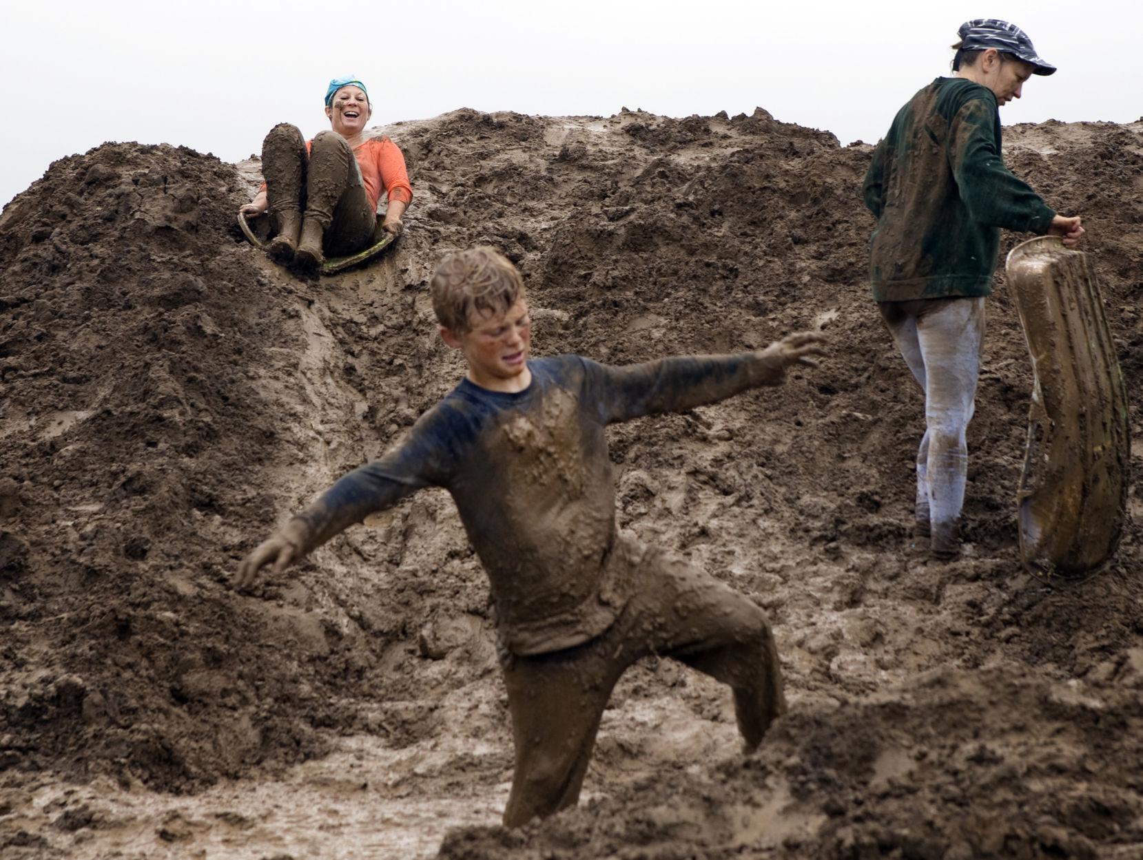 Playing in the mud at a rainy River's Edge
